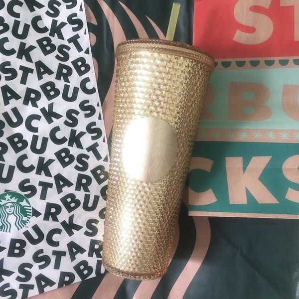 

limited edition starbucks gold studded cup
