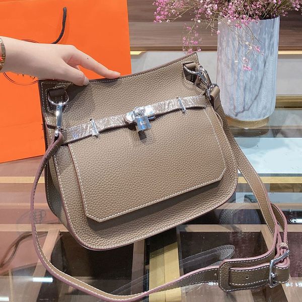 

2021 new fashion leisure genuine leather bag shoulder bag fannypack handbags fashion plain stone hasp artwork lock key chain, Blue;pink