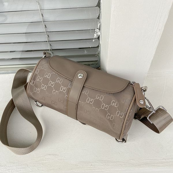 

fashion cylinder women's pillow letter with tiaodi large capacity leisure messenger bag handbags