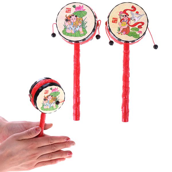 10pcs bebek çıngırak oyuncaklar çocuklar karikatür Çin geleneksel çıngırak davul spin eğlenceli el çan müzik oyuncakları