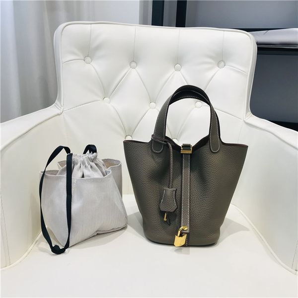 

new head leather litchi pattern women's bag gold button vegetable basket bucket fashion simple leisure hand purses luxury outlet