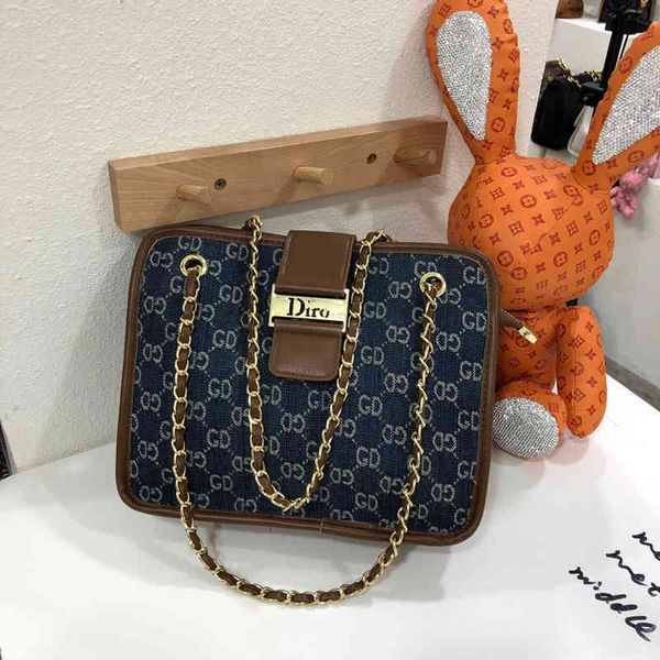 

2022 factory wholesale net red denim diagonal backpack in autumn and winter