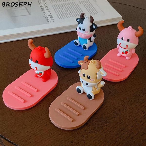 

bedside desklazy phone holder creative cute cartoon cow universal stand ornaments gift for friend girlfriend family cell mounts & holder