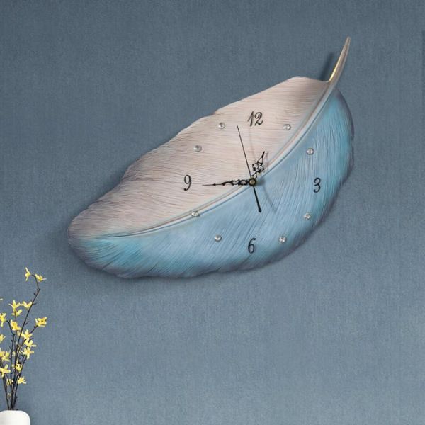 

wall clocks creative minimalist feather light luxury clock hanging simple modern home decoration bedroom living room wf1103