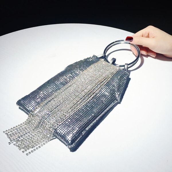 

backpack celebrity hand holding dinner small fringed bag fashion handbag