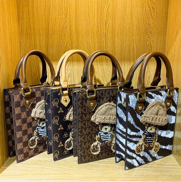 

wholesale ladies shoulder bag retro printed leather handbag street trend cartoon decoration women handbags personality vertical fashion snak