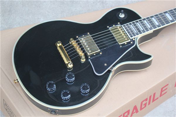 

customized black gloss electric guitar with ebony fretboard and fret binding