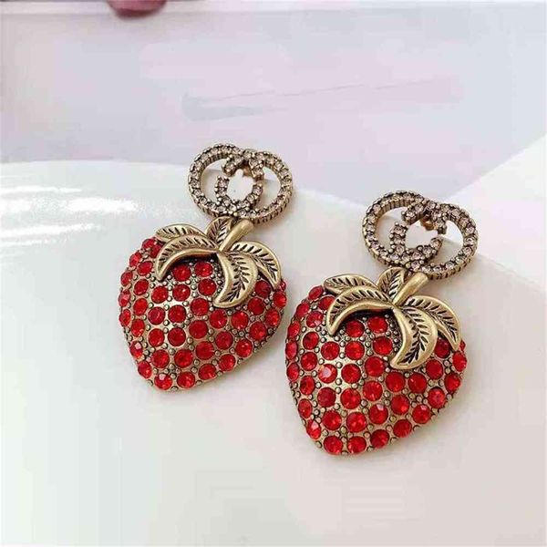 

70% off outlet online 2021 double strawberry red earrings brass earrings female silver needle store wholesale, Golden