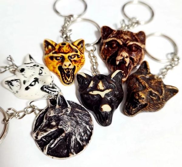 

12 pcs imitation mixed wolf totem yak bone carved cute key chains keyrings for men women car keychains, Slivery;golden