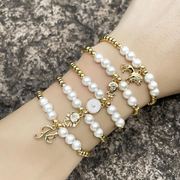 

charm bracelets eyika fashion copper beads pearl elastic chain boy and girl zircon couple bracelet letter fe lion women bangle statement jew, Golden;silver