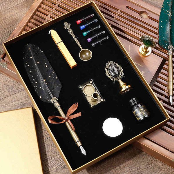 

feather golden pen student english ink bag set gift box can be engraved at low price