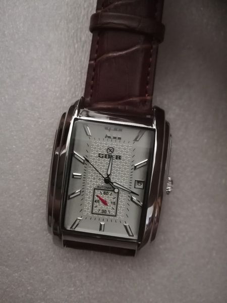 

goer watch, Slivery;brown