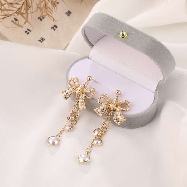 

s925 silver needle japanese and korean sweet bow earrings female french baroque court long tassel pearl earrings