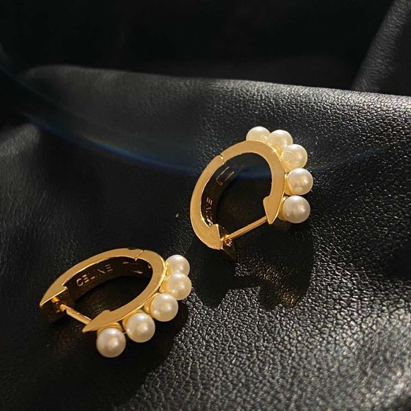 

sailin family temperament commuting pearl circle heavy industry texture earrings real gold and silver needle color burden female