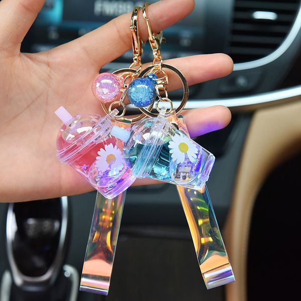 

2021 fashion keychain acrylic oil bottle with lamp milk tea cup little daisy cartoon bag pendant car key chain ring, Slivery;golden