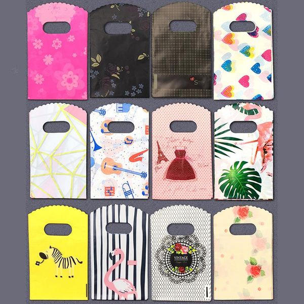 

gift wrap 50pcs/lot multi pattern available small plastic bag with heart handle mini jewelry packaging 9x15cm/13x21cm