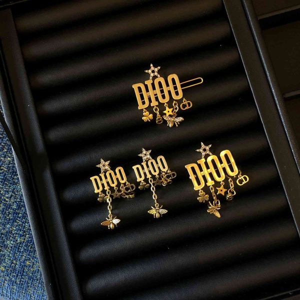 

2021 newd family letter star tassel earrings for women's 20-year new dijia net red high version hairpin brooch-wholesale, Golden