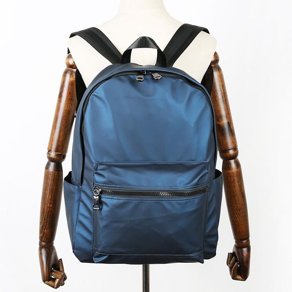 

solid color men's backpack 2021 fashion schoolbags leisure travel women's
