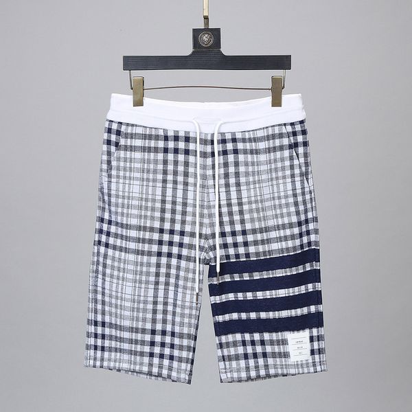 

2021 summer new men's plaid shorts yarn-dyed four bars men and women same korean casual sports beach guard pants, White;black