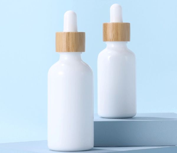 

frosted amber white glass dropper bottle 15ml 30ml 50ml with bamboo cap 1oz wooden essential oil bottles
