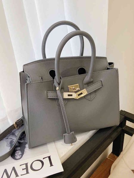 

big temperament hand 2020 new versatile one shoulder messenger litchi soft leather women's bag