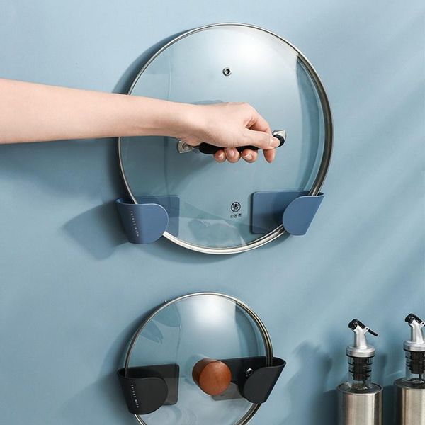 

self adhesive pot lid holder punch-pan cover storage rack wall mounted kitchen organizer & organization