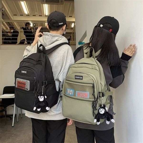

2021 new high school student backpack, male and female couple schoolbag, trendy cool work clothes, high-capacity computer backpack