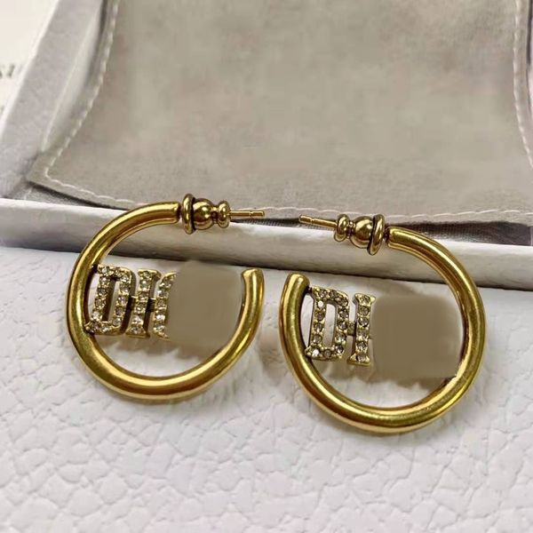 

21 new cd cd letter earrings seiko bronze cd earrings, Golden;silver