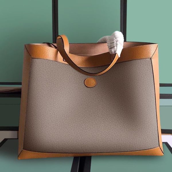 

547947 light brown leather bag piping details give a retro look printed in colour embroidery stickers or jacquard pattern bags womens ophidi