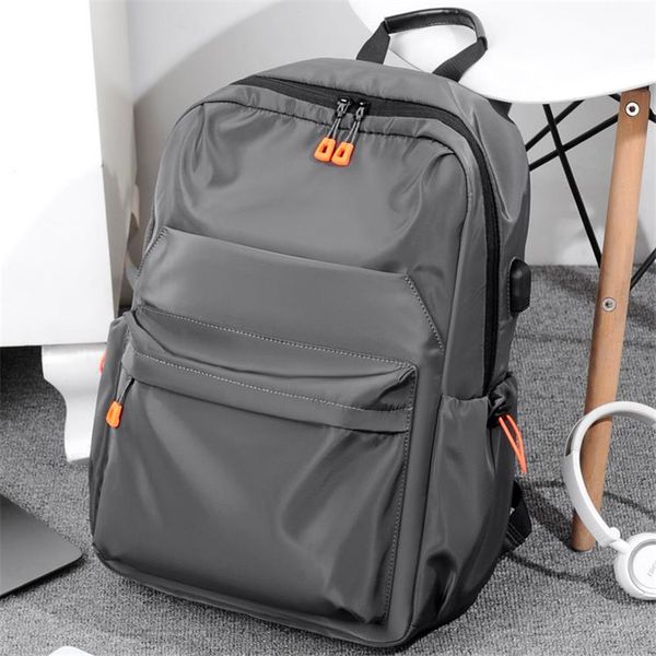 

spring new casual fashion lightweight black computer bags large capacity travel bag backpack wholesale with usb charging port fit 15.6 inch