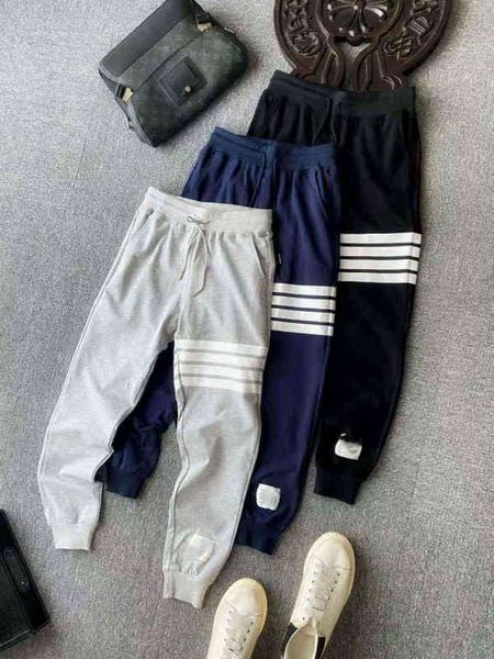 

2022 factory wholesale new autumn trendy tb three bar printed drawstring casual loose age reducing legged couple sweatpants, Black;white