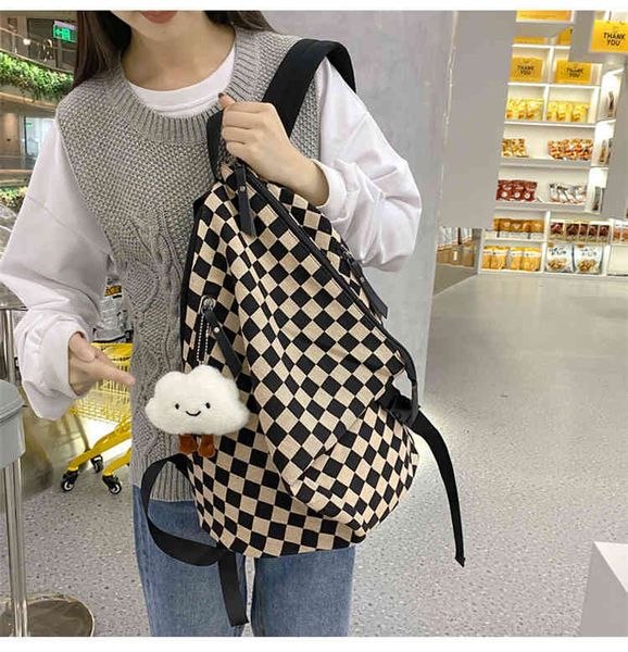 

backpack handbags bags ins checkered tide brand large capacity leisure travel bag female schoolbag male high junior student