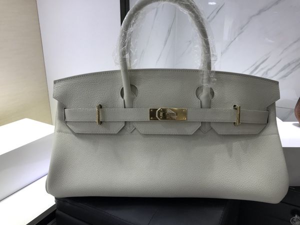 

fully handmadequality togo leather designers purse 42cm wax stitching gold or silver hardware by order only dont have in stock contact for