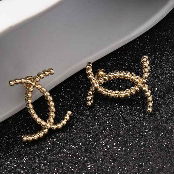 

stud 2021 elegant gold earrings cross hug small flexible silver pin design light style banquet shiny exclusive, Golden;silver