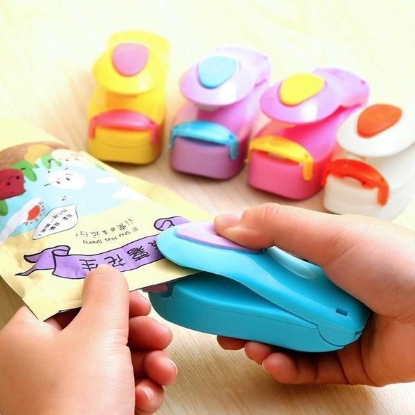 

mini portable bag clips home electric heat sealing machine ceramic impulse vacuum capper for packing plastic clip