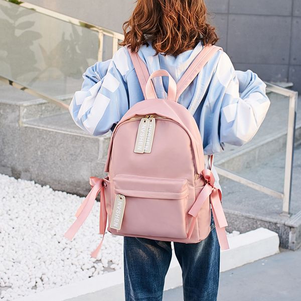 

designer bags high grade schoolbag female backpack korean version junior high school students campus university simple large capacity niu ji