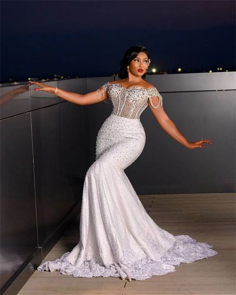 Abiti da sposa a sirena scintillanti 2022 Abiti da sposa con spalle scoperte Abito in pizzo africano taglie forti Perle pesanti Paillettes abiti da sposa