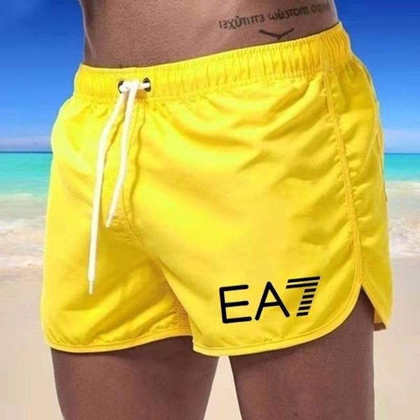 

gym clothing beach pants 2021 men's three-quarter fashion sports swimming trunks cycling running pan, White;black
