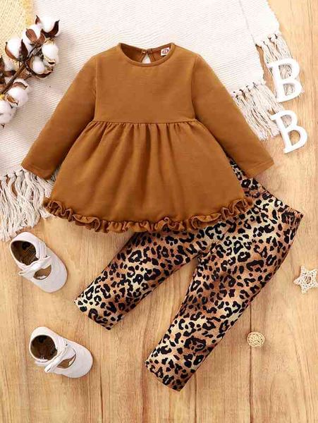 

baby frilled peplum hem & leopard print leggings she, White