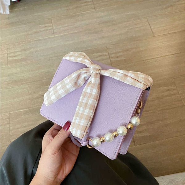 

designer luxury bag design on western style new pure color bow small square casual versatile lattice one women's leather handbag