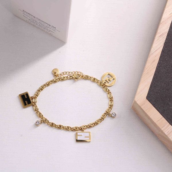 

design jewelry decoration titanium steel hollowed out letter black and white square contrast small diamond great wall pattern chain bracelet