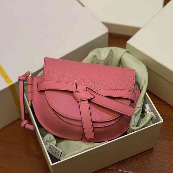 

2022 factory outlet online luxury handbags gate mini saddle leather half round lychee pattern versatile fashion bow single shoulder slant sp
