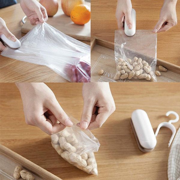 

Household Convenient Mini Plastic Bag Preservation Small Sealing Machine Hand Pressure Heat Vacuum Clips