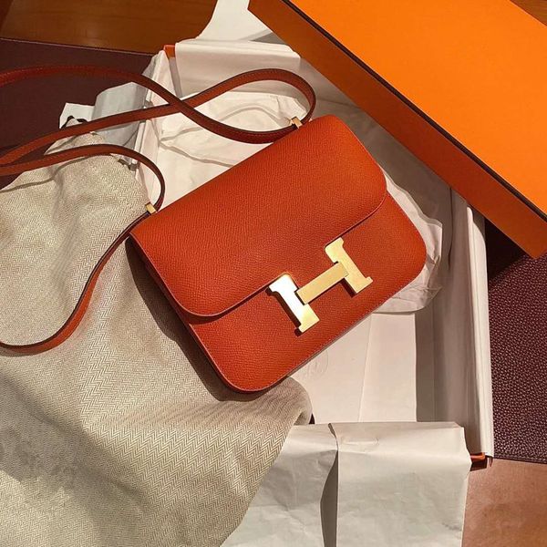 

2021 new h-button kangkang bag fashion stewardess bag calf leather women s bean curd single shoulder small square luxury designer