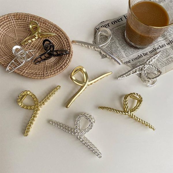 Clipes de cabelo Barrettes 2021 Coréia elegante metal dourado Garra francesa arranhões sem costura lua simples arco de arco irregular GRASP para mulheres sede