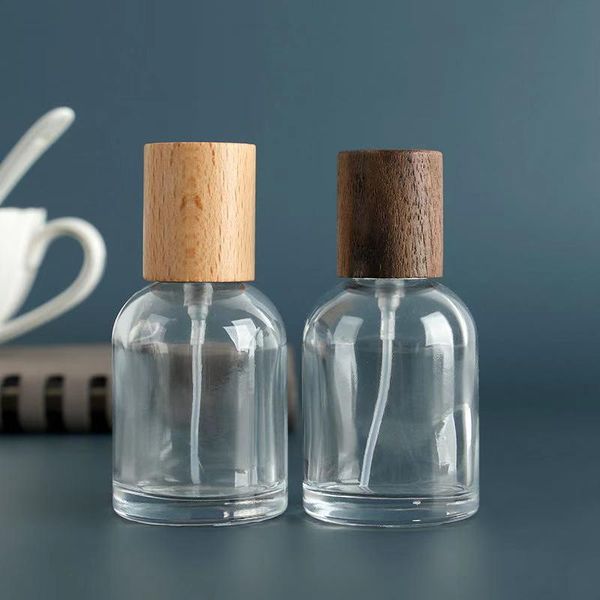 

30ml/50ml bayonet polished glass spray perfume bottle with wooden cap storage bottles & jars