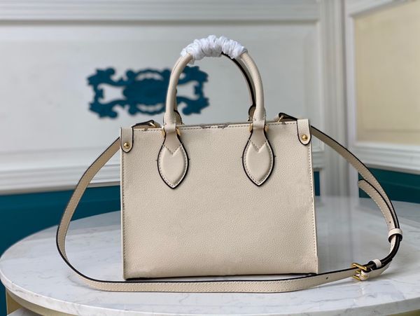 

woman fashion tote travel shopping bag onthego bicolor empreinte multifunctional leather giant pattern adjustable removable strap