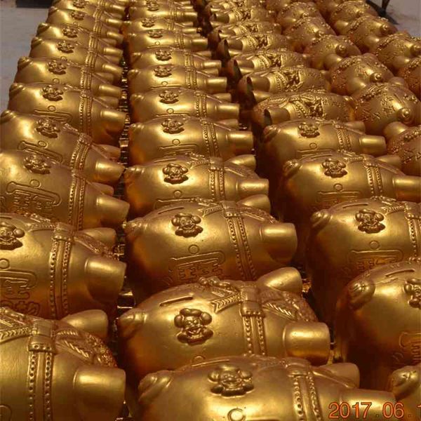 

golden pig smashing golden egg