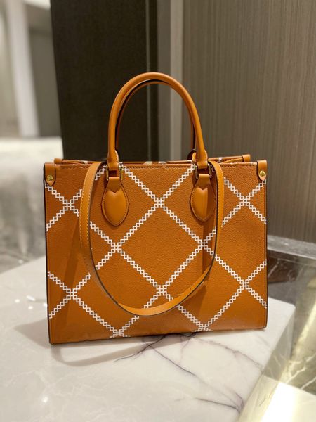 

2021 latest high-quality fashion classic bag with leather letter handbag, old messenger women's handbag and embossed shoulder bag.