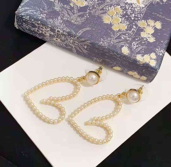 

70% off new peach earrings heart pearl earrings net red same girl, Golden